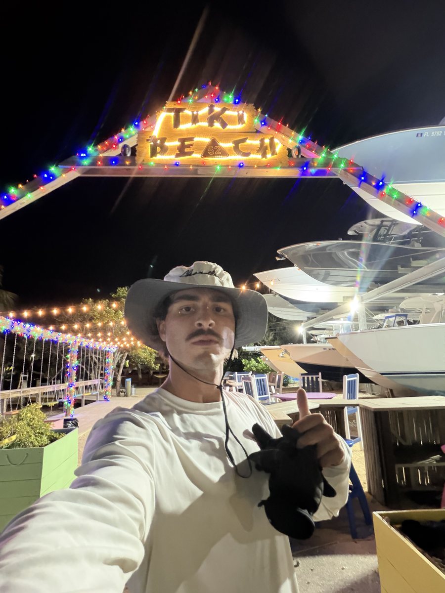 Kelsey Launi at Tiki Beach with holiday lights